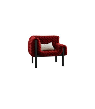 Ruby red quilted velvet accent chair with exposed black metal frame and cream lumbar cushion