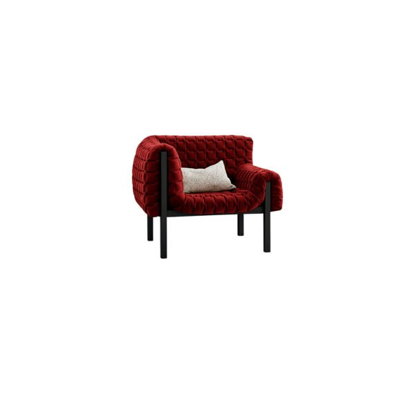 Ruby red quilted velvet accent chair with exposed black metal frame and cream lumbar cushion